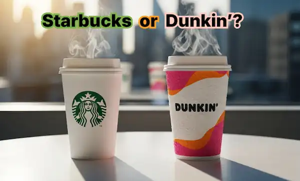 Starbucks and Dunkin’ coffee cups side by side on a cafe table in 2025